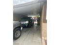 Carport area featuring an ample parking spot for two vehicles at 3616 Reynolds Ave, North Las Vegas, NV 89030