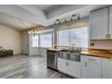 Bright kitchen and breakfast nook with stainless steel appliances, butcher block countertops, and natural light at 6357 Vicuna Dr, Las Vegas, NV 89146