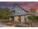 Charming two-story home with stone accents and professionally landscaped front yard at 3069 Lascari Ave, Henderson, NV 89044