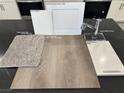 Interior design scheme featuring carpet, vinyl plank, cabinets, quartz counters, and chrome faucet at 3759 Via Allegro, Henderson, NV 89044