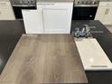 Interior design scheme featuring flooring, white cabinets, quartz counters and chrome faucet at 3759 Via Allegro, Henderson, NV 89044
