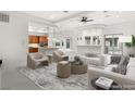 Bright, open-concept living room featuring modern decor and a seamless flow to the kitchen at 540 Regents Gate Dr, Henderson, NV 89012