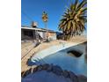 Backyard with desert landscaping with a gunite pool, perfect for outdoor entertaining at 5809 Pebble Beach Blvd, Las Vegas, NV 89108