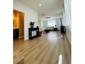Inviting living room with new floors and lots of natural light, perfect for relaxing or entertaining at 6495 Little Harbor Ct, Las Vegas, NV 89141