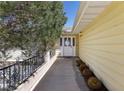 Charming front entrance with a well-maintained walkway and desert landscaping at 879 Judi Pl, Boulder City, NV 89005