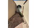 Charming walkway with brick pavers and custom window detail welcomes you home at 2796 Cape Hope Way, Las Vegas, NV 89121