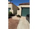 Charming home featuring a gated entrance, two-car garage, and desert-friendly landscaping at 2796 Cape Hope Way, Las Vegas, NV 89121