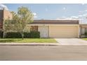 Street view of a home with a landscaped front yard, a driveway, and an attached garage at 3287 Southridge Ave, Las Vegas, NV 89121