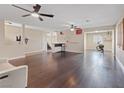 Spacious living room boasting dark hardwood floors and lots of natural light at 429 Sunburst Dr, Henderson, NV 89002
