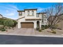 Charming two-story home with a well-maintained lawn, brick driveway, and a welcoming front entrance at 640 Hayborn Meadows St, Las Vegas, NV 89138