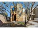Charming two-story home with covered front entrance, an attached garage and low maintenance yard at 7506 Village Mist Ln, Las Vegas, NV 89113