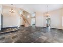 Spacious foyer with staircase and decorative tile flooring at 10024 Skipper Ct, Las Vegas, NV 89117