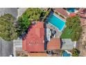 Stunning aerial view of the property showcasing the backyard pool and lush landscaping at 1853 Heydon Ct, Henderson, NV 89014
