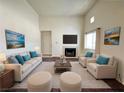 Bright living room with high ceilings, fireplace, comfortable seating, and decor at 1964 Las Palmas Ln # 244, Laughlin, NV 89029