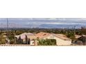 Expansive mountain and city views from this home atop a hill at 2212 Sierra Heights Dr, Las Vegas, NV 89134