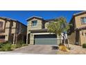Lovely two-story home with well-manicured desert landscaping, paver driveway, and two-car garage at 3820 Ramura Ave, North Las Vegas, NV 89084