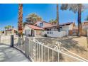Charming two-story home with a well-maintained front yard and a two car garage at 5049 Hibbetts Ct, Las Vegas, NV 89103