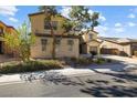 Two-story home with a two car garage and low maintenance front yard at 6909 Forest Gate St, North Las Vegas, NV 89084