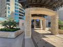 Elegant stone archway and paved entryway add a touch of sophistication at 9101 Alta Dr # 18, Las Vegas, NV 89145