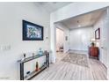 Welcoming foyer features neutral walls, light tile flooring, and stylish decor, creating an inviting entrance at 1012 Terron Allen Ave, North Las Vegas, NV 89031