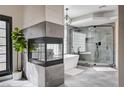 Beautiful bathroom featuring a modern shower, stylish bathtub and neutral color palette at 167 Ebb Tide Cir, Las Vegas, NV 89123