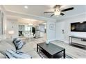 Open floor plan with living and dining areas, offering a seamless flow and modern design at 1701 E Katie Ave # 9, Las Vegas, NV 89119