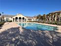 Resort-style community pool offers a relaxing escape and is perfect for swimming laps at 4561 Woolcomber St, Las Vegas, NV 89115