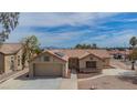 Charming single-story home featuring desert landscaping, tile roof, and attached two-car garage at , Las Vegas, NV 89134