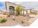 Inviting front exterior with stone accents and desert landscaping at 10943 Doresta Ave, Las Vegas, NV 89166