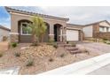 Beautiful front exterior with desert landscaping and charming architectural details at 10943 Doresta Ave, Las Vegas, NV 89166