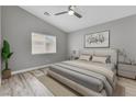 Bedroom featuring neutral decor, ceiling fan, and a window at 11016 Meadow Leaf Ave, Las Vegas, NV 89144