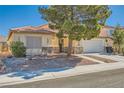 Charming single-story home with desert landscaping and a welcoming front entrance at 1708 Gentle Brook Ave, Las Vegas, NV 89084
