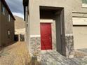 Close up shot of a front door with stone accents on the exterior of the home at 4243 Sago Lily St, Las Vegas, NV 89129