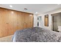 Comfortable bedroom featuring carpet and a wall-to-wall wardrobe closet at 7341 Girard Dr, Las Vegas, NV 89147