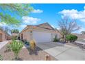 Well-maintained home featuring low maintenance desert landscaping, spacious driveway and attached two-car garage at 7845 Scammons Bay Ct, Las Vegas, NV 89129
