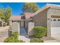 Inviting home featuring a desert landscape and a pathway leading to the main entrance at 8628 Desert Holly Dr, Las Vegas, NV 89134