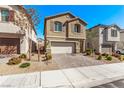 Well-kept two-story house with charming facade and paved driveway at 10160 W Meranto Ave, Las Vegas, NV 89178
