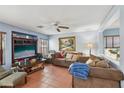 Comfortable living room features stylish decor, tile floors, and ample natural light at 11620 Longhirst Hall Ln, Las Vegas, NV 89138