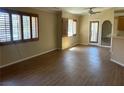 Bright living room showcasing wood-style flooring, natural light, and an open layout at 340 Manti Pl # 0, Henderson, NV 89014