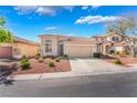 Well-kept single-story residence with an attached garage, neat landscaping, and a driveway, offering curb appeal at 4631 Forest Shadow Ave, Las Vegas, NV 89139