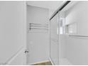 Clean, updated bathroom with a glass shower door and modern fixtures at 703 Greenbriar Townhouse Way, Las Vegas, NV 89121