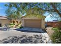 Inviting two-story home with a well-maintained front yard and attached two-car garage at 8853 Autumn Teal Ave, Las Vegas, NV 89178
