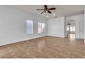 Bright living room with neutral tile flooring and ample natural light at 1016 Echo Beach Ave, North Las Vegas, NV 89086