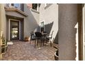 Charming courtyard patio features pavers and an outdoor seating area at 193 Elder View Dr, Las Vegas, NV 89138