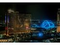 Striking nighttime aerial shot of the Wynn and nearby buildings in Las Vegas at 2000 N Fashion Show Dr # 4302, Las Vegas, NV 89109