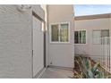 A close-up of the front door and front yard of the property at 2146 High Dunes Ln, Laughlin, NV 89029