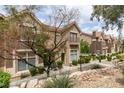 Inviting townhouse complex with manicured landscaping and attractive exterior design at 2787 Fountain Ridge Ln, Henderson, NV 89074