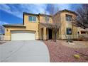 Beautiful two-story home with desert landscaping, stucco exterior, and attached two car garage at 3938 E Chaffe Ave, Pahrump, NV 89061