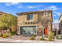 Attractive two-story house with a two-car garage, desert landscaping, and a welcoming front entrance at 4442 Solitude Falls Ave, North Las Vegas, NV 89084