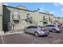 Side view of the building with balconies and permit parking at 7054 Burcot Ave # G40, Las Vegas, NV 89156